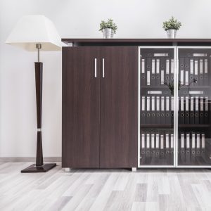 Modern home office interior with wooden furniture